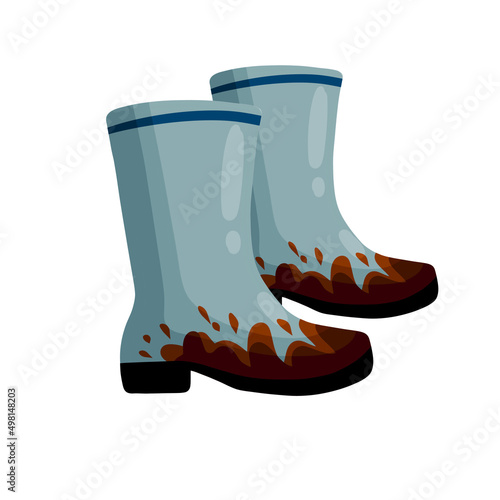 Rubber muddy boot with dirt. Waterproof rain shoes for fishing and gardening.