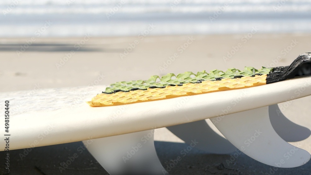 Αυτοκόλλητο Surfboard for surfing lying on beach sand, California coast, USA