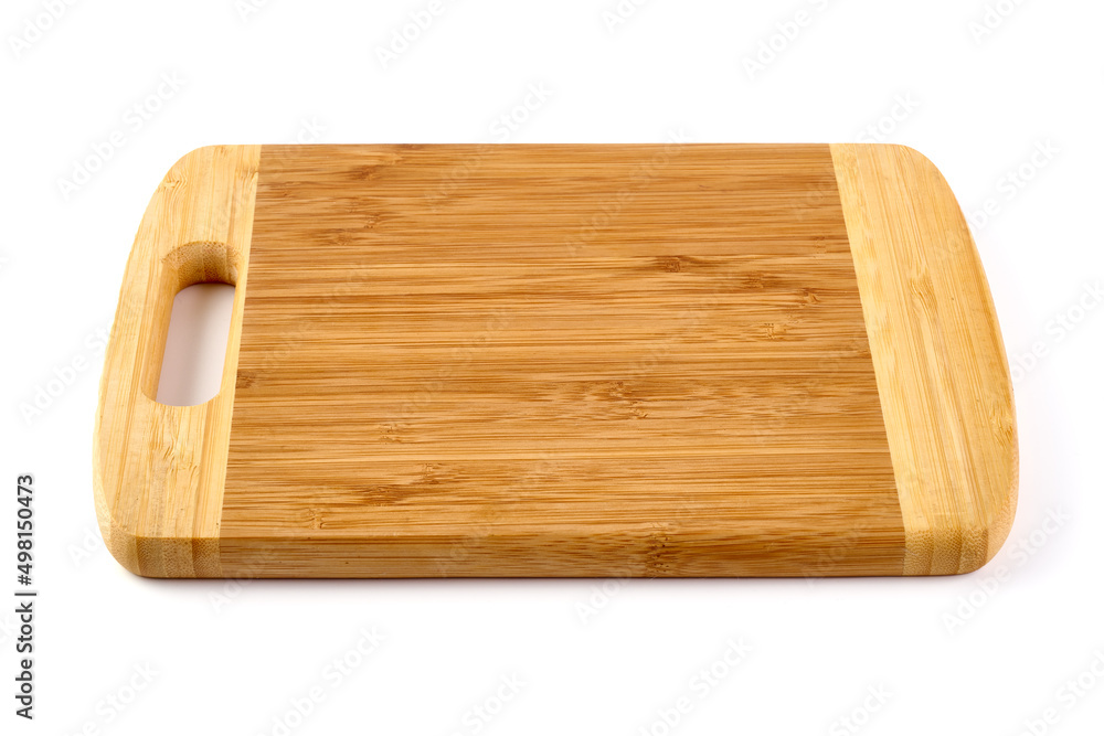 New rectangular wooden cutting board, isolated on white background. New rectangular wooden cutting board, isolated on white background.