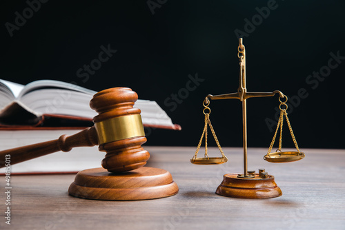 scales with judge gavel and law book
