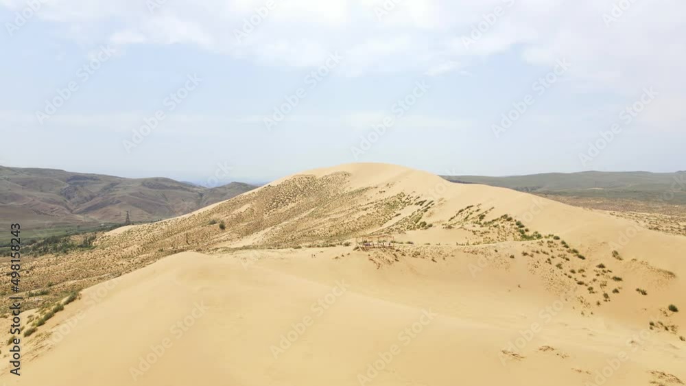 Sarykum is the largest sand dune in Europe. Dagestan nature reserve. Drone view Sarykum is the largest sand dune in Europe. Dagestan nature reserve. Drone view