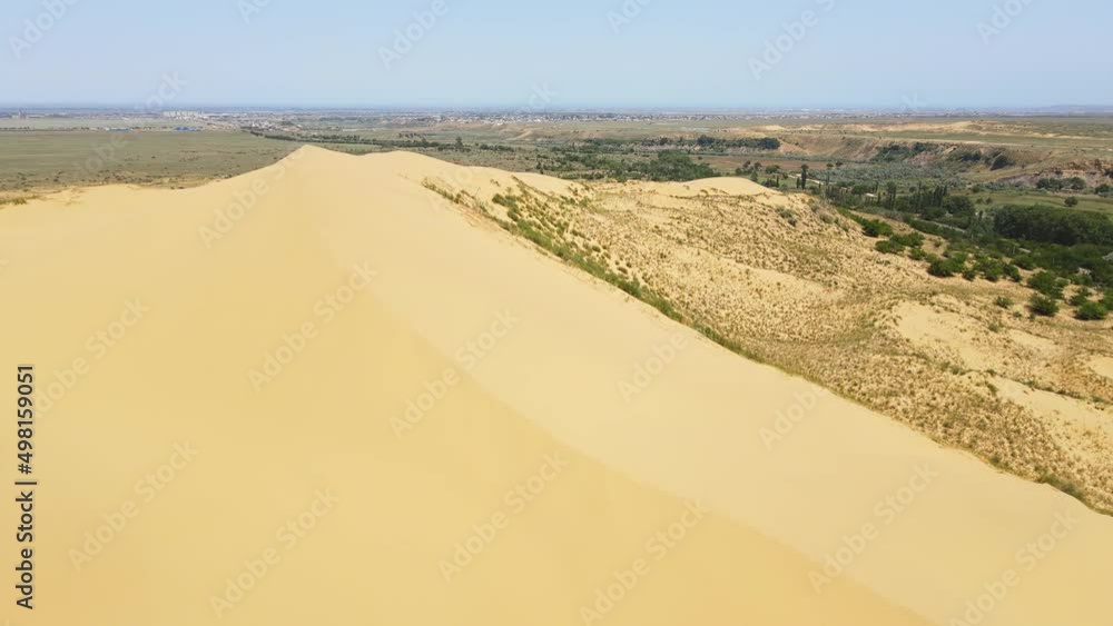 Sarykum is the largest sand dune in Europe. Dagestan nature reserve. Drone view Sarykum is the largest sand dune in Europe. Dagestan nature reserve. Drone view