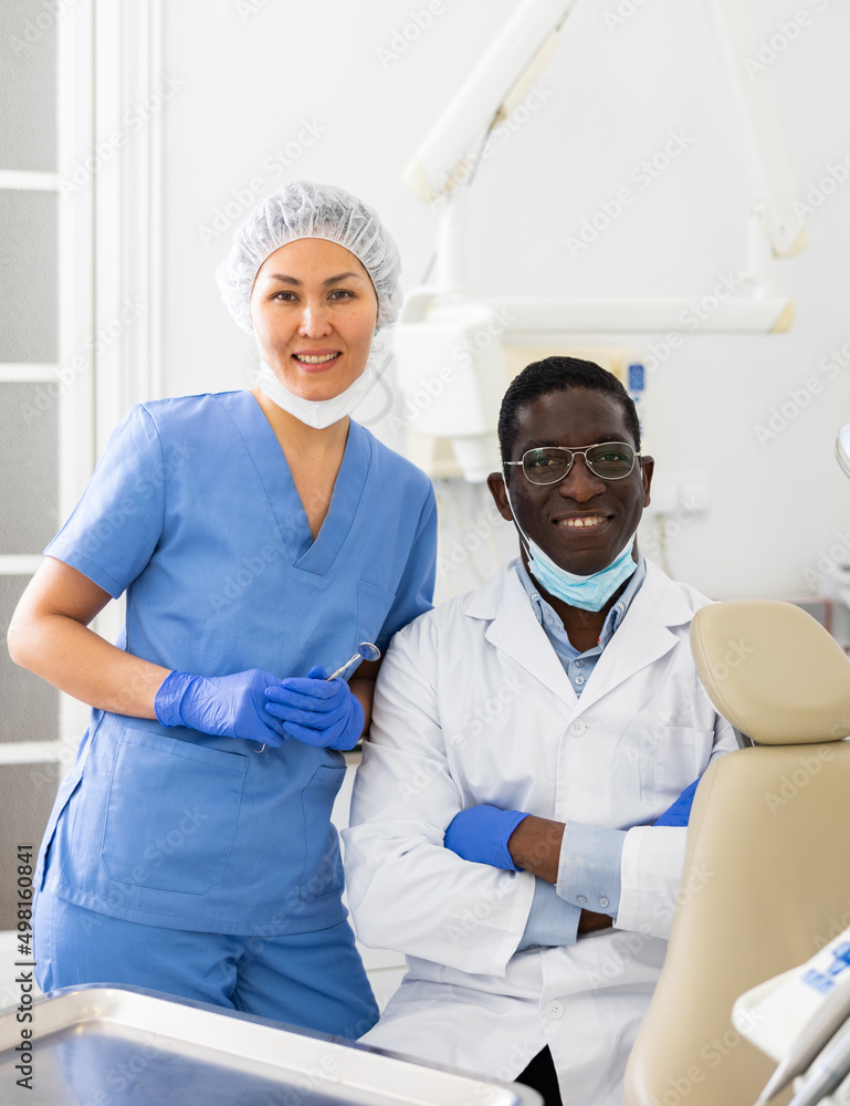 Portrait of doctor and a nurse in a dental office