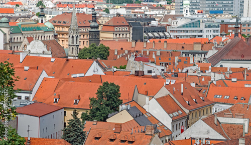 Canvas Print Towers and steeples pop up among the red tile rooftops of Bratislava, Slovakia
