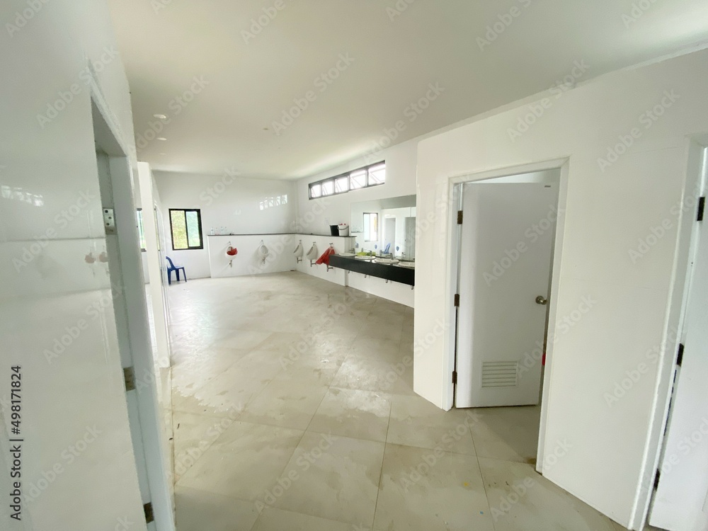 Toilet room for men with urinals sinks and mirrors Toilet room for men with urinals sinks and mirrors