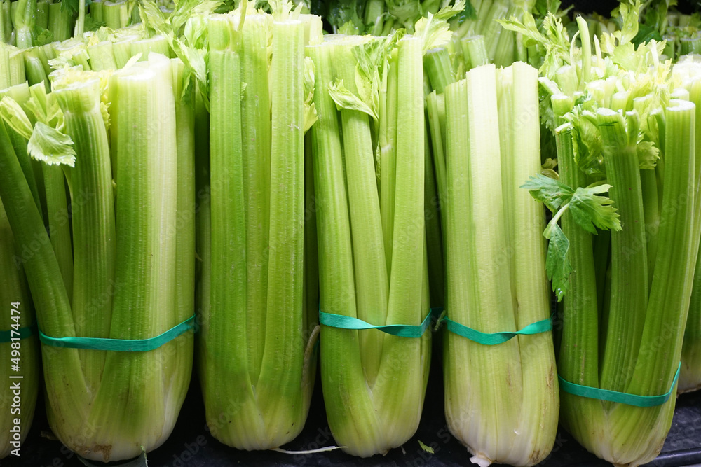fresh celery on sale in grocery store