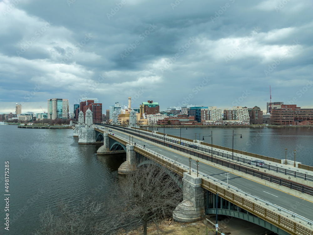 Aerial view of Longfellow Bridge connecting Boston downtown and Cambridge Massachusetts with  a subway train passing by