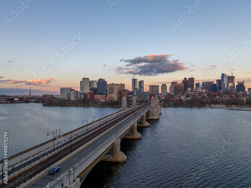 Sunset over Boston downtown with sky scrapers with views of the Longfellow bridge over the Charles river