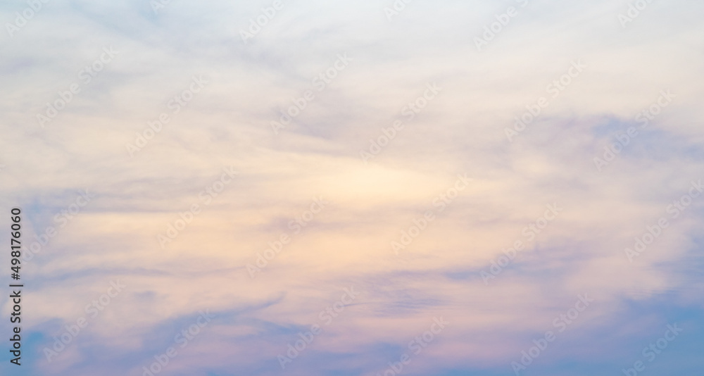 Colorful sky background with the orange and purple clouds, sunset at twilight. Nature abstract concept.