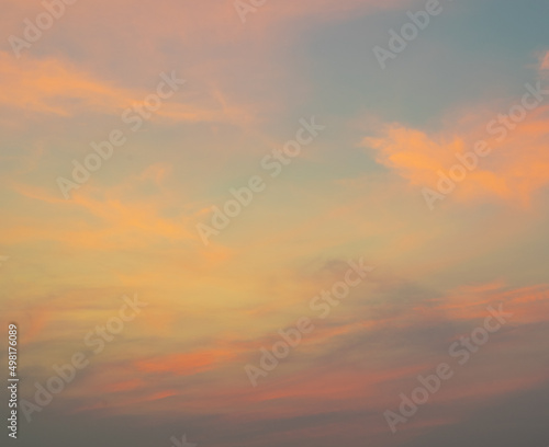 Fototapeta Naklejka Na Ścianę i Meble -  Colorful blue sky background with the orange cloud, sunset at twilight. Nature abstract concept.