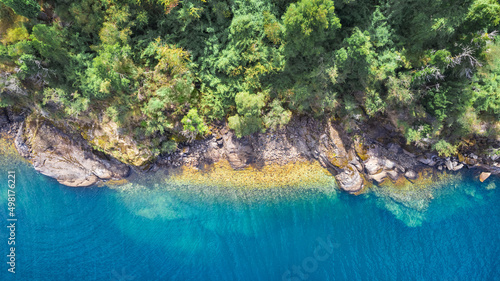 island shore to depth water in lake with blue water