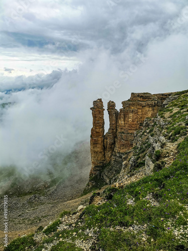 The Bermamyt Plateau and the rocks of two monks in a cloud, Caucasus, Russia 2021. June
