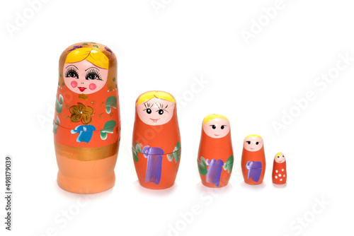 Colorful colored nesting dolls on a white background. Russian national souvenir © Иван Грабилин