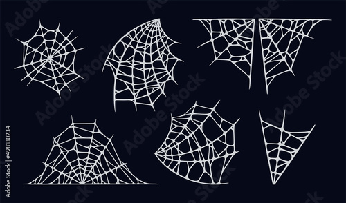 Spider web set isolated on black background. Spooky Halloween cobwebs. Handrawn vector illustration