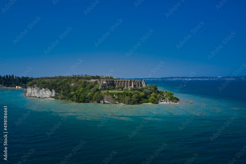 Archaeological site of Grotte di Catullo, Sirmione, Italy early morning aerial view. lake garda. Cave Catullo Sirmione Italy