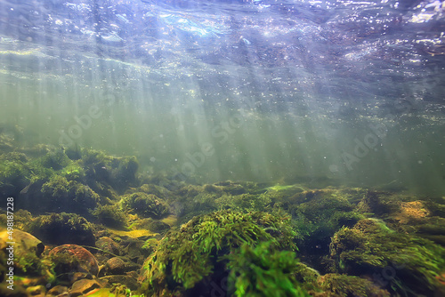 sun rays under water landscape, seascape fresh water river diving © kichigin19