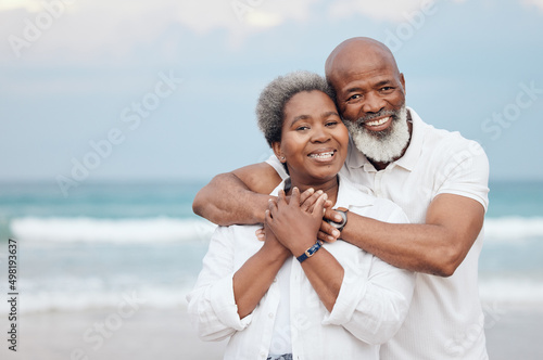 I am him, he is me. Shot of a mature couple spending time at the beach. #498193637