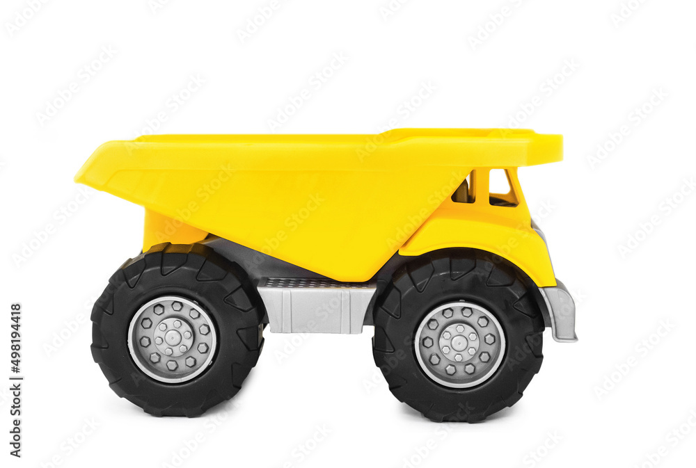 yellow plastic toy mining tipper dumper truck, isolated yellow plastic toy mining tipper dumper truck, isolated