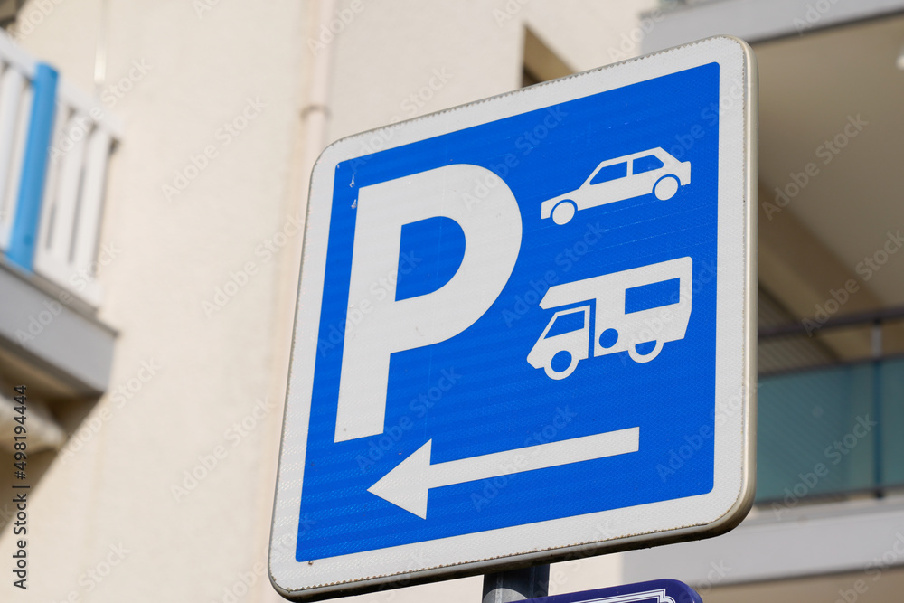 parking p arrow sign blue camper car motorhome parked in city street parking p arrow sign blue camper car motorhome parked in city street