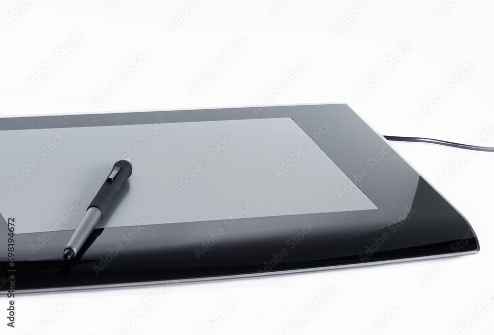 the digital tablet and pen, isolated the digital tablet and pen, isolated