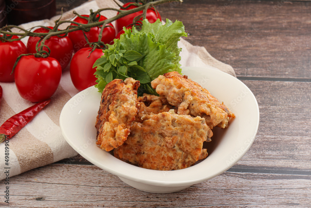 Fried salmonn cutlet in the bowl Fried salmonn cutlet in the bowl