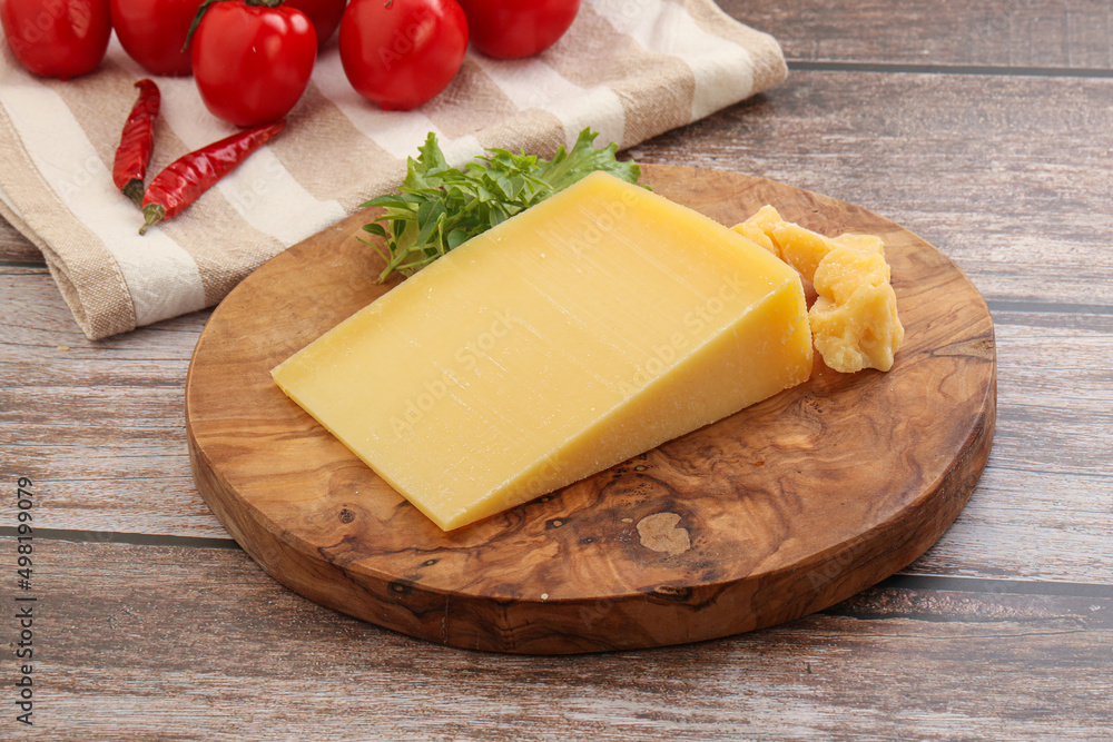 Parmesan hard cheese with small pieces Parmesan hard cheese with small pieces
