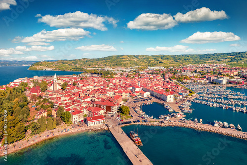Captivating summer cityscape of Izola town, Slovenia. Superb morning seascape of Adriatic sea. View from flying drone of old sea port. Сharm of the ancient cities of Europe.  #498201486