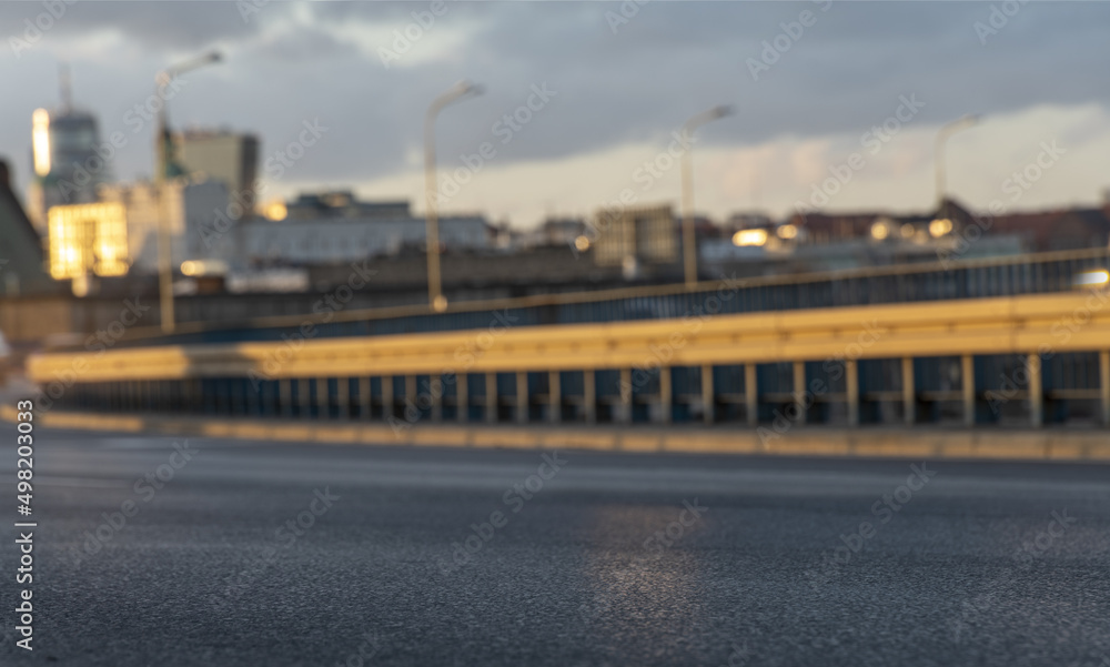 Backplate-asphalt expressway in the evening light with the use of depth of field