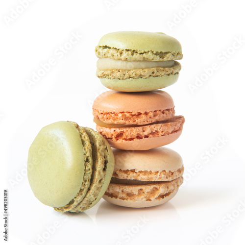 Pile of fresh cakes, cookies macaron or macaroon , sweet and colorful dessert, isolated on white background