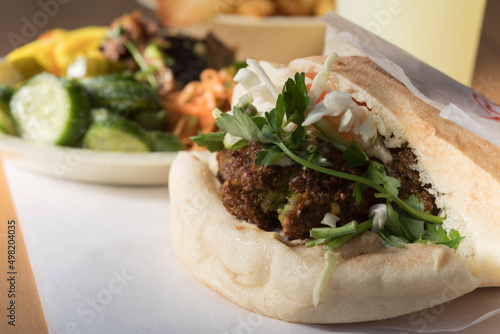 Falafel in pita bread with fries 
