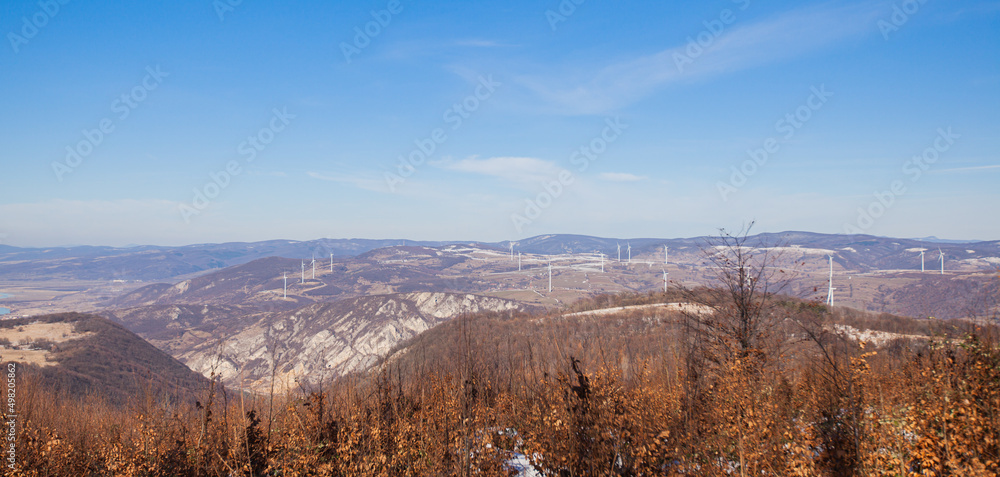 View Of Beautiful Winter Snowy Nature Landscape. Blue Sky. Forest, Hills And Fields Winters Season. View Of Beautiful Winter Snowy Nature Landscape. Blue Sky. Forest, Hills And Fields Winters Season.