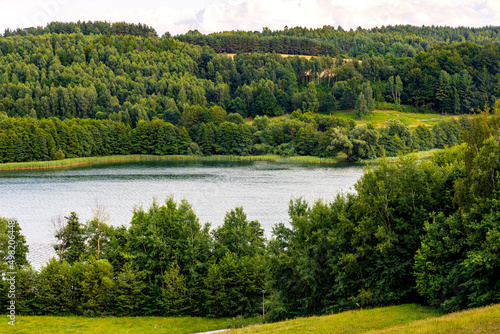 Panoramic view of Jezioro Brodno Wielkie lake with shores of forest and Sarnowka hill top seen from Zlota Gora Golden Mountain in Brodnica in Pomerania of Kashubian region of Poland