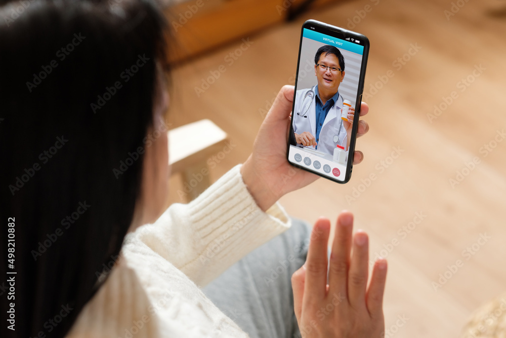 Consulting doctor visit on mobile app at home.telemedicine