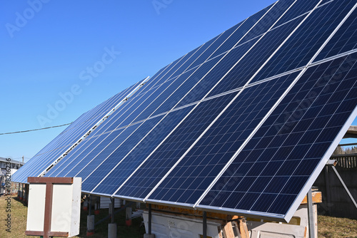 High resolution photo of solar panels against a clear blue sky in good weather