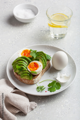 breakfast avocado sandwich with boiled egg