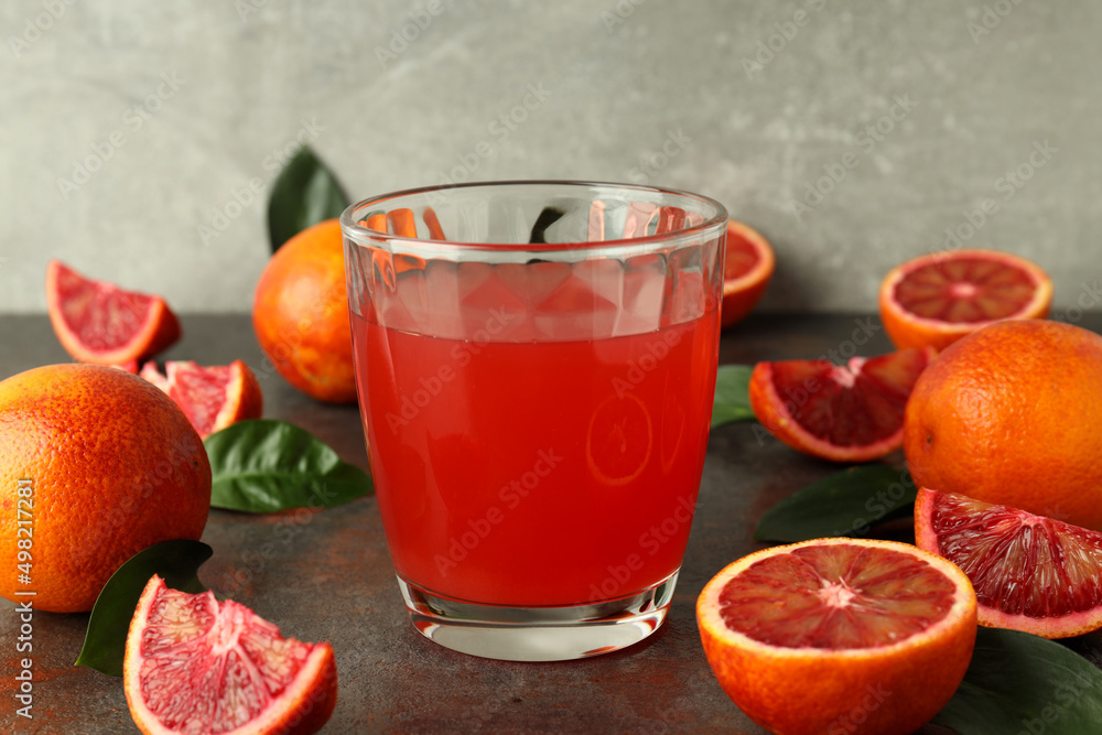 Concept of fresh drink with red orange juice, close up Concept of fresh drink with red orange juice, close up
