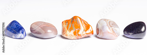 Mineral stones on a white background. The concept of using minerals in astrology and alternative or complementary medicine