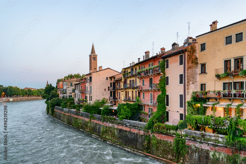 Naklejka premium Facades of old houses on waterfront of the Adige River, Verona
