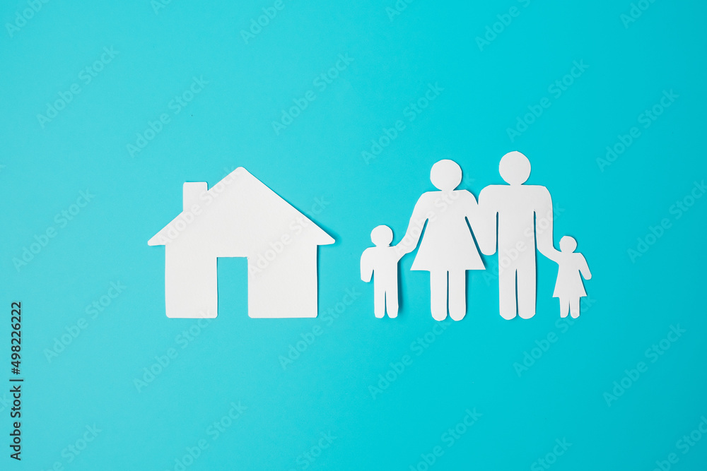 Happy Family day. paper shape cutout with Father, Mother, Children and Home. international day of families, Warm home, love, Foster, Insurance, Charity and Donation concepts. Happy Family day. paper shape cutout with Father, Mother, Children and Home. international day of families, Warm home, love, Foster, Insurance, Charity and Donation concepts.
