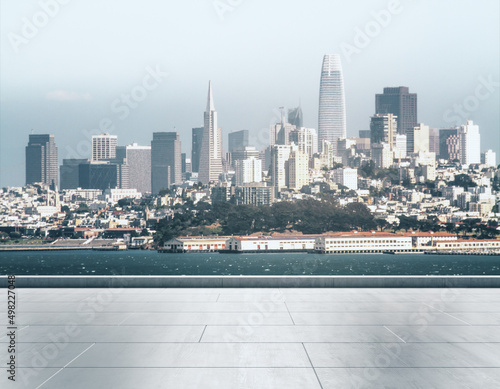 Empty concrete embankment on the background of a beautiful San Francisco city skyline at daytime, mockup