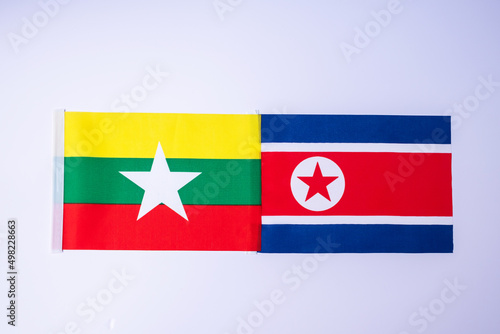 North Korea against Myanmar flags. freindship, war, conflict, Politics and relationship concept Free Download North Korea against Myanmar flags. freindship, war, conflict, Politics and relationship concept - GFXLoad