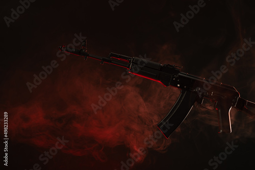 kalashnikov assault rifle in smoke photo