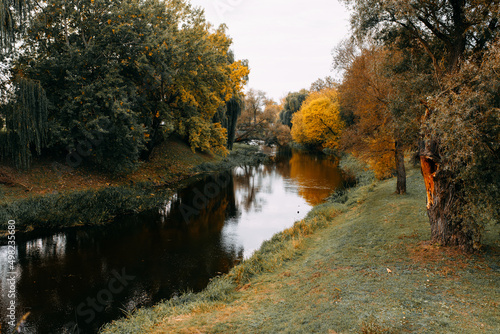 Beautiful autumn park with a river
