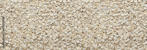 Full screen pressed oat grains. Closeup of grains of oatmeal in full screen.