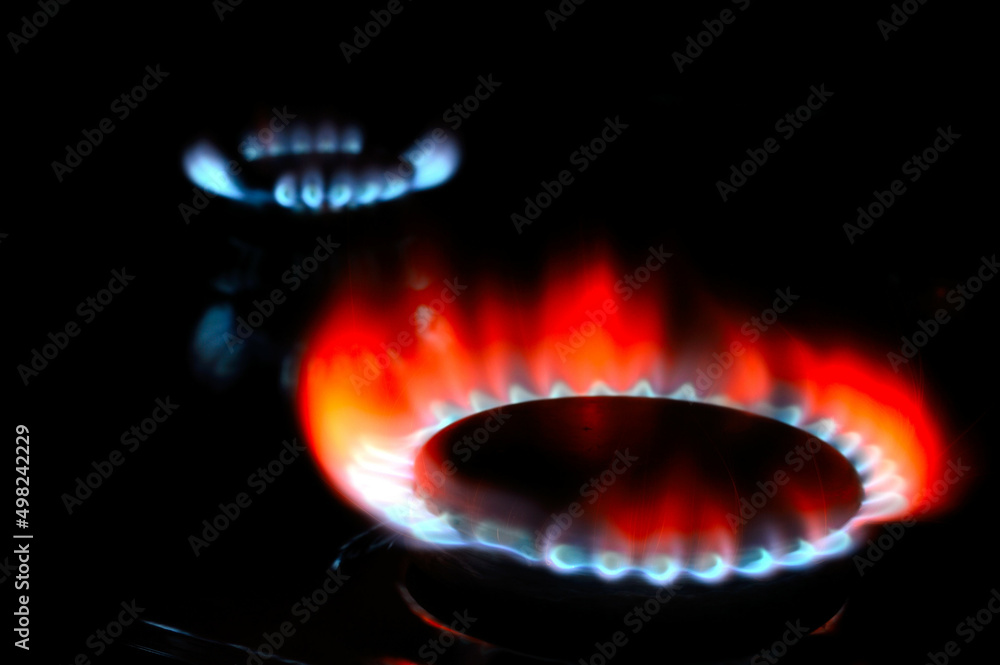 gas burner with burning gas. dark background gas burner with burning gas. dark background