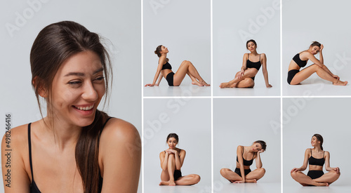 Beautiful young woman posing in black underwear isoated over gray studio background. Youth, beauty, tenderness concept