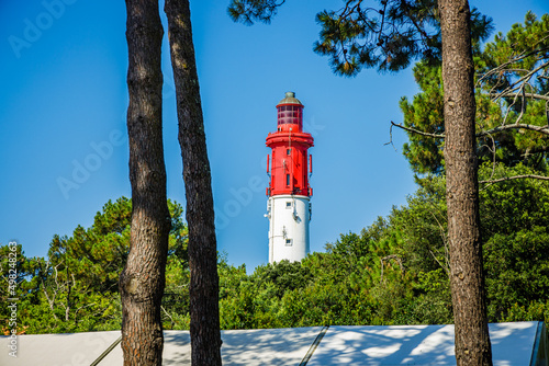 Cap Ferret lighthouse on the Arcachon bay, on a summer day in France photo