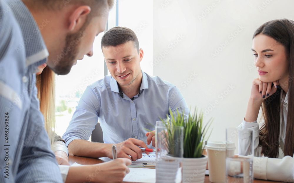 Portrait of smart business partners planning work at meeting Portrait of smart business partners planning work at meeting