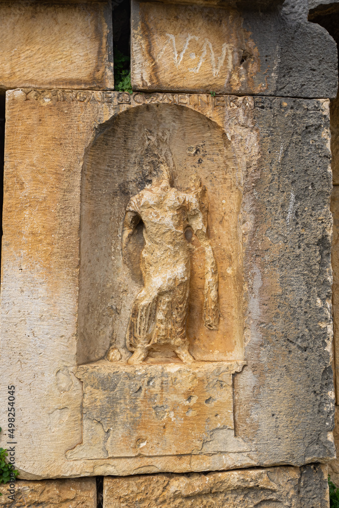 Obraz premium Tyche with the inscription “Fortune of the city, be ever victorious, good luck”. Myra Ancient City. Demre, Antalya, Turkey.