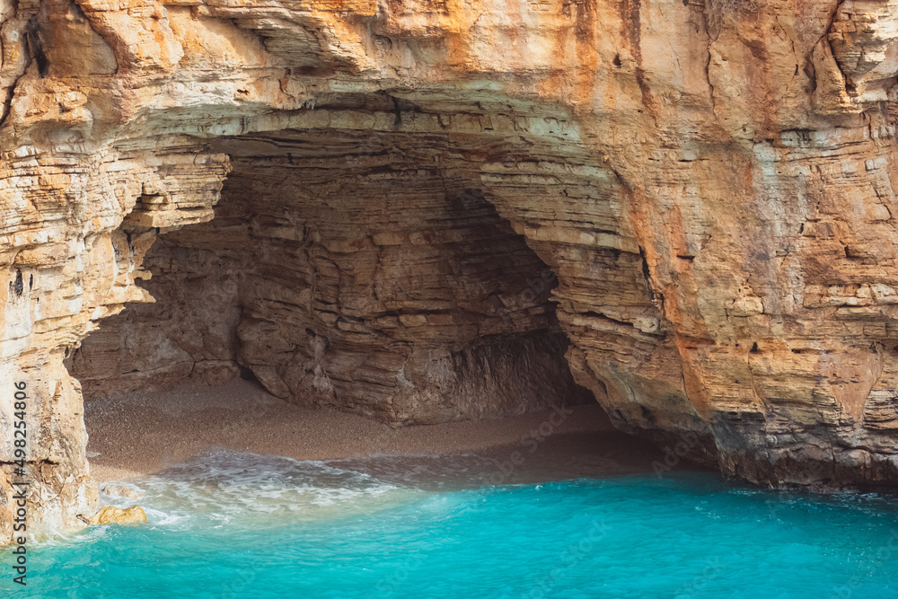 A close view of the cove with cave on the Demre - Finike road. Antalya, Turkey